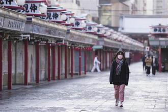 日本東京新增確診數有趨緩跡象。圖為東京街頭。（圖／美聯社）