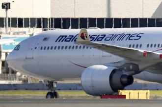 
澳洲警方指出，馬來西亞航空（Malaysia Airlines）MH122班機今天下午從澳洲雪梨飛往馬來西亞首都吉隆坡時，機上一名乘客情緒焦躁、「涉嫌擾亂秩序」，聲稱背包裡有「爆裂物」，導致班機在起飛約3小時後返抵雪梨機場。(圖/美聯社)