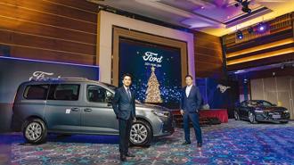 福特六和汽車發表新車，總經理陳文芳（左起）與營銷服務處副總黃煌文樂觀明年業績成長。圖／業者提供
